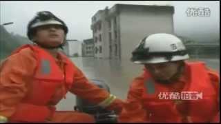 Emergency services ride boat through flooded town in China