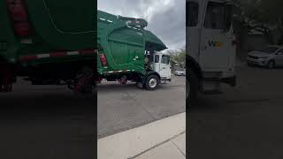 waste management front loader passing by