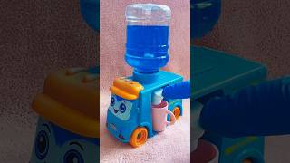 Blue bus water dispenser with a white and blue car Royal carpet pump dispenser #shortvideo #shorts