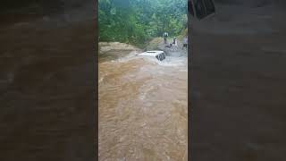 Cars overcome heavy floods