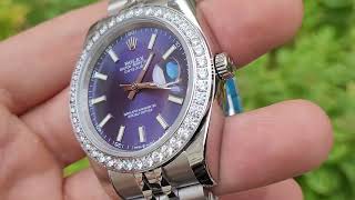 Rolex blue dial diamond bezel