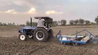 Koi parwaah nhi jahaaj nu. New Holland 5620 with 20 Disc harrow fully opened.