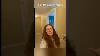 Girl falls down stairs