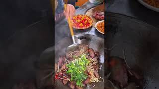 The Process Of Cooking Fried Bacon With Garlic Sauce