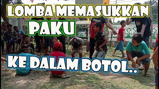 Lomba Memasukkan Paku Dalam Botol - Bocil Baradatu