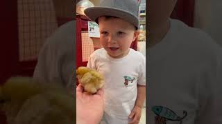 Kamps first time holding a chicken!