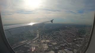 Delta A320 from Detroit touching down at New York-LaGuardia