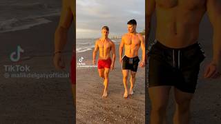 Hot and Sexy Malik Delgaty with other Hot Man walking on Beach | Gay Shorts