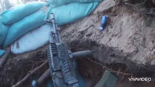 POV Ukraine soldier ￼shooting from a trench