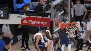 Luka Doncic was doing water bottle flips during a timeout in overtime