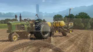 John Deere 3020 and 7000 planting corn