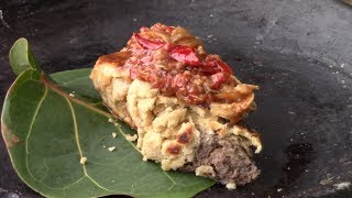 Caribbean pork sausage with bread and chili sauce