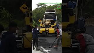 Dump Truck Pouring Hot Mix Asphalt Into Finisher #shorts #constructionequipment #asphaltpaving #truk