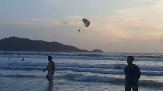 Phuket beach Patong walk with a beautiful sunset crabs parasailing big waves 2p