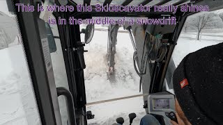 Moving snow with the Mecalac 8MCR skidscavator