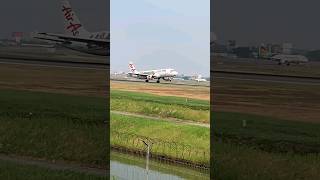 AIR ASIA (livery Lake Toba) landing di bandara Soekarno Hatta.