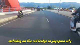 motovlog on the red bridge in jayapura city