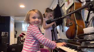 Bella and Liv - piano and vocals