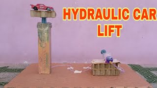 how to make a hydraulic car lift in Malayalam using 2 syringes hydraulic lift making fully explained