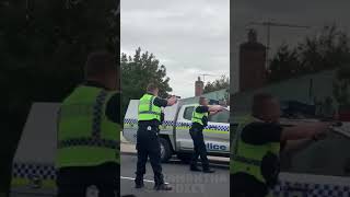 Bloke with a knife surrounded by cops gets mowed down