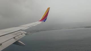 Southwest 737-700 landing on a misty, drizzly afternoon in Montego Bay, 3-9-20