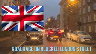 Two drivers get annoyed for blocking each other on tiny London road