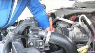 Removing Stubborn Radiator Fan Bolts Using the Chain Method