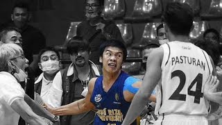 JOHN AMORES THROWS PUNCHES on the court in the JRU-Benilde match