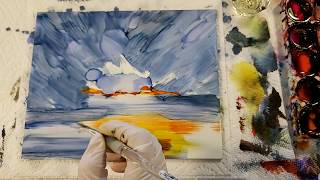 Alcohol ink painting sunset on water