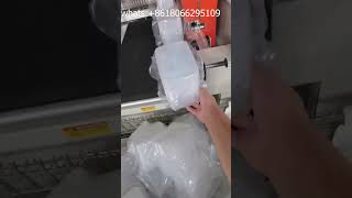 Meal box packaging machine。餐盒自动包装机