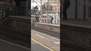 London Overground class 710 passes Stratford.