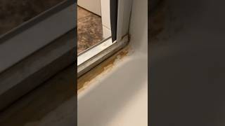 Cleaning a Shower Track with just Vinegar!