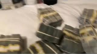 Blac youngsta flexing with $2 million dollars on his bed