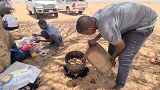 Cooking lunch in the Sahara Desert in the Tiris Zemmour Region, Mauritania.