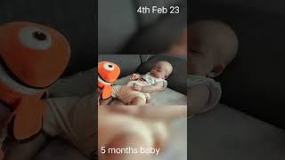 Teasing a baby with fish doll. long version