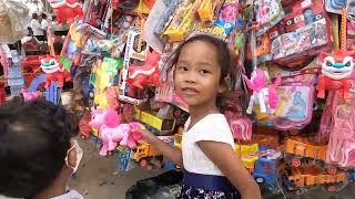 buy some toys during Pchum Ben day