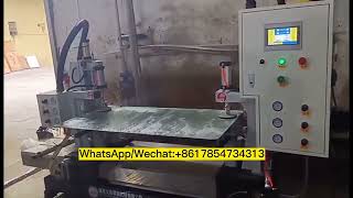 Double-head glass edge grinding machine