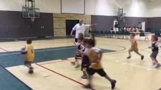 Identical twins play basketball