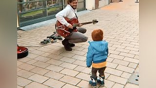 This Kid is Feeling the Music! Dancing with Street Performer