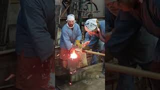 consolidating the raw material into a solid mass #japan #steel#knife #blacksmith #art #fire