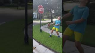 Boy taking his ball for a walk