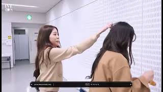 Wonyoung reaching out to fix Yujin’s messy hair bcz she took a nap before