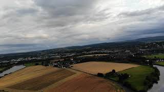 Drone flying toward Cambuskenneth, Scotland from the National Wallace Monument