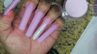 Light pink bling nails