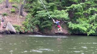 Rope swinging on the lake