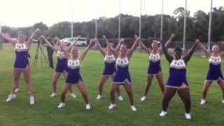 Ball High cheerleaders warm up for La Marque