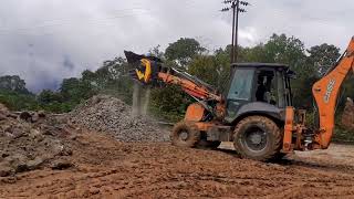 The MB-L160 Crusher Bucket in Action on a Backhoe Loader in India