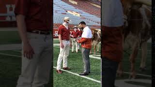 University of Texas Silver Spurs present Steve Sarkisian with a set of spurs