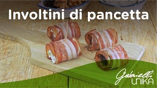 Involtini di pancetta con prugne ripiene