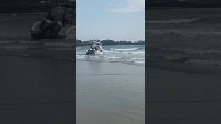 Fishing boat grounded at Higgins Beach [sea tow]